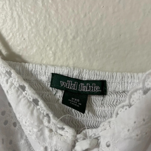 Wild fable size XXS White eyelet crop top adjustable straps and tie in the front - Picture 2 of 4